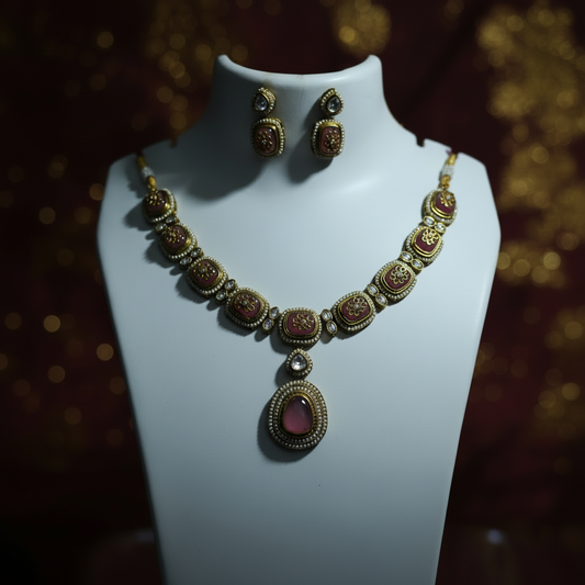 Jewelry set with necklace and earrings on a mannequin bust